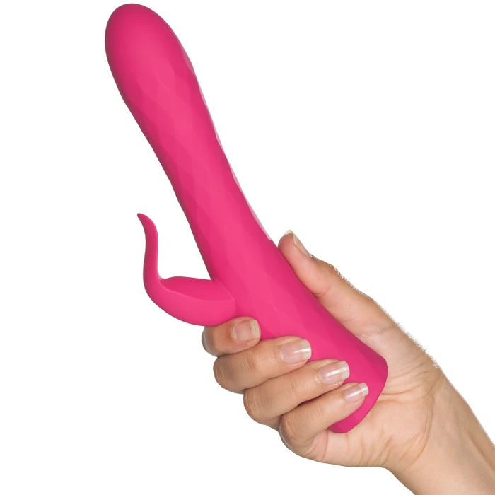 Hand hält pinken Dildo